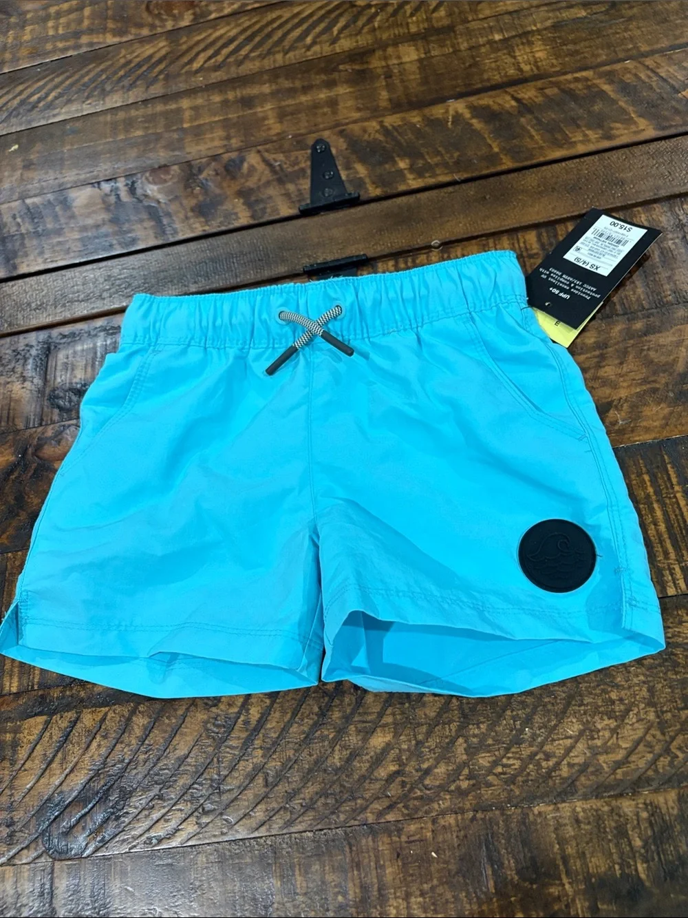 Swim Shorts with Waist Tie in blue turquoise color